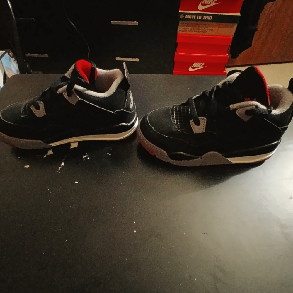Gently worn toddler boys Jordan IV in Black/Red/Cement